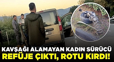 Kavşağı alamayan kadın sürücü refüje çıktı, rotu kırdı!