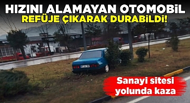 Hızını alamayan otomobil refüje çıkarak durabildi!