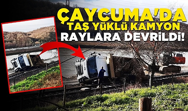Çaycuma'da taş yüklü kamyon raylara devrildi!